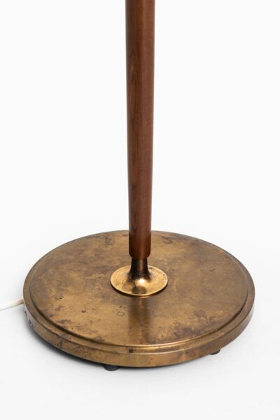 Böhlmarks floor lamps in brass and mahogany at Studio Schalling