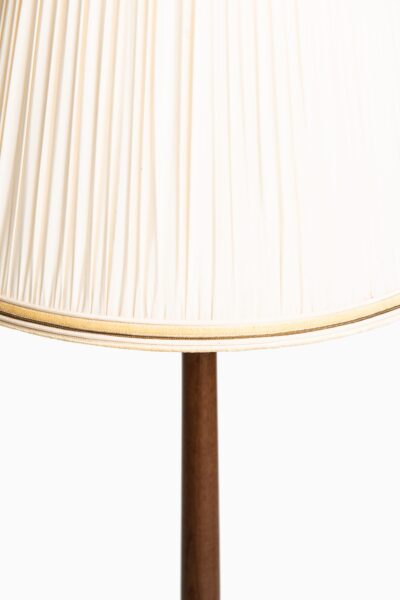 Böhlmarks floor lamps in brass and mahogany at Studio Schalling