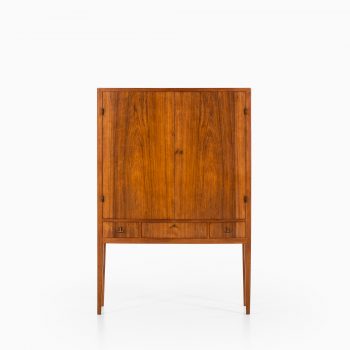 Rosewood cabinet with brass details at Studio Schalling