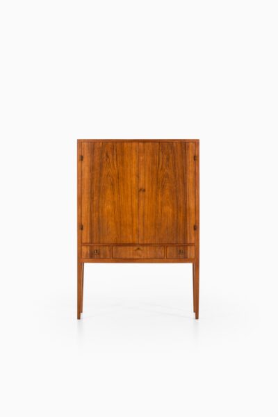 Rosewood cabinet with brass details at Studio Schalling