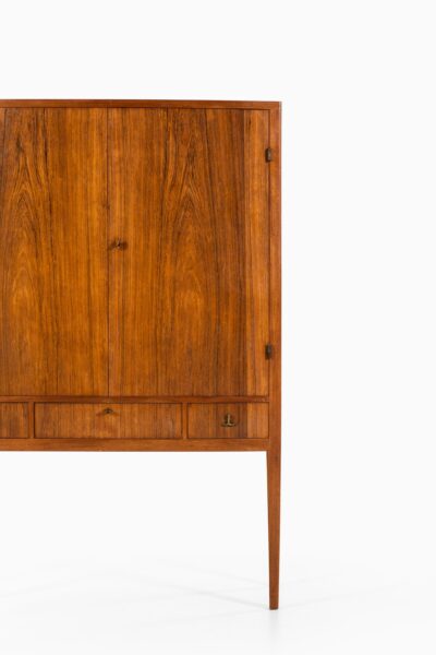 Rosewood cabinet with brass details at Studio Schalling