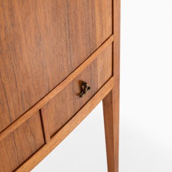 Rosewood cabinet with brass details at Studio Schalling