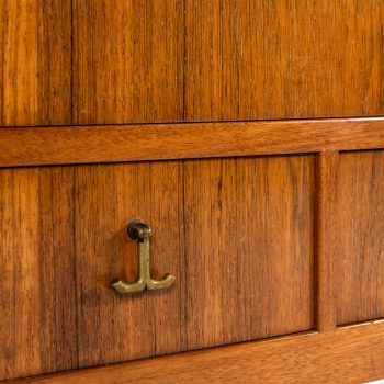 Rosewood cabinet with brass details at Studio Schalling