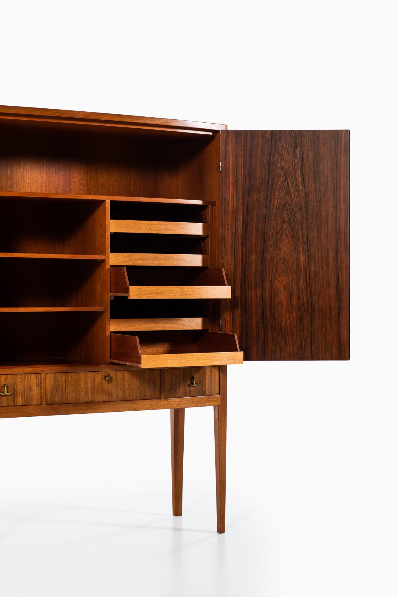 Rosewood cabinet with brass details at Studio Schalling