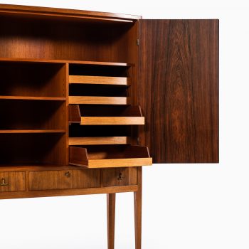 Rosewood cabinet with brass details at Studio Schalling