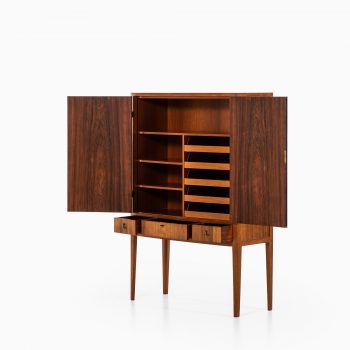 Rosewood cabinet with brass details at Studio Schalling