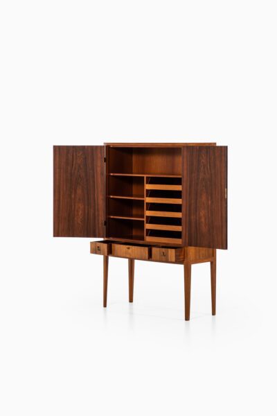 Rosewood cabinet with brass details at Studio Schalling