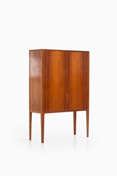 Rosewood cabinet with brass details at Studio Schalling