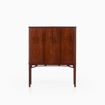 Rosewood cabinet with brass details at Studio Schalling