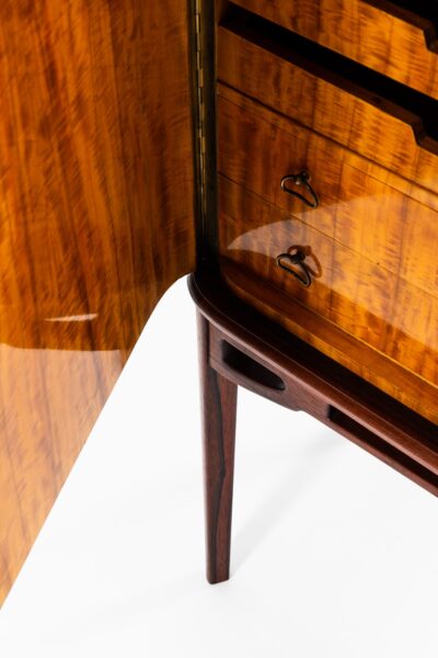 Rosewood cabinet with brass details at Studio Schalling