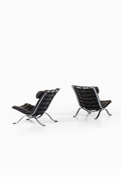 Arne Norell Ari easy chairs with stools at Studio Schalling