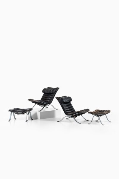 Arne Norell Ari easy chairs with stools at Studio Schalling