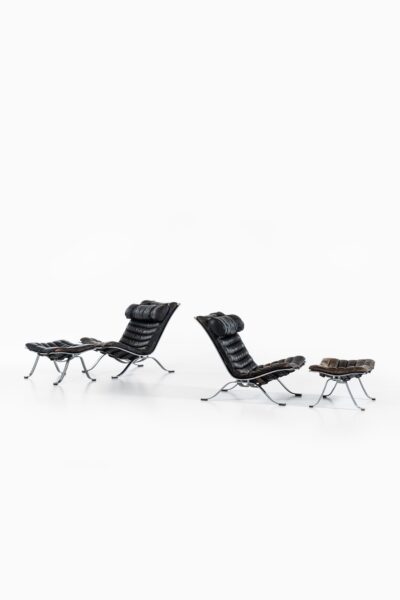 Arne Norell Ari easy chairs with stools at Studio Schalling