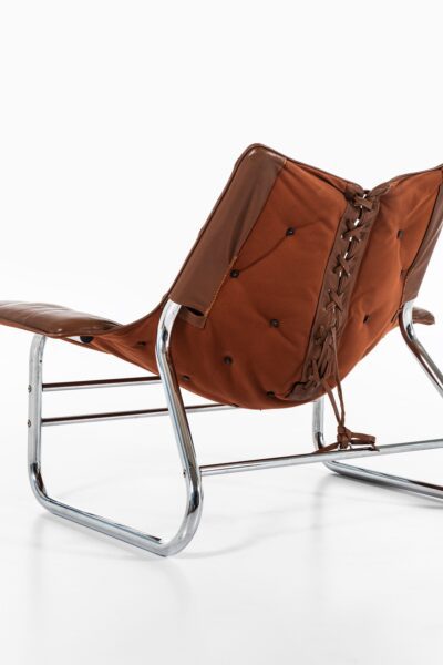 Easy chair in chromed steel and leather at Studio Schalling