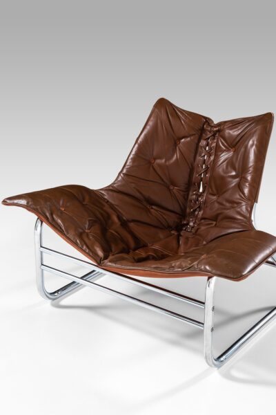 Easy chair in chromed steel and leather at Studio Schalling