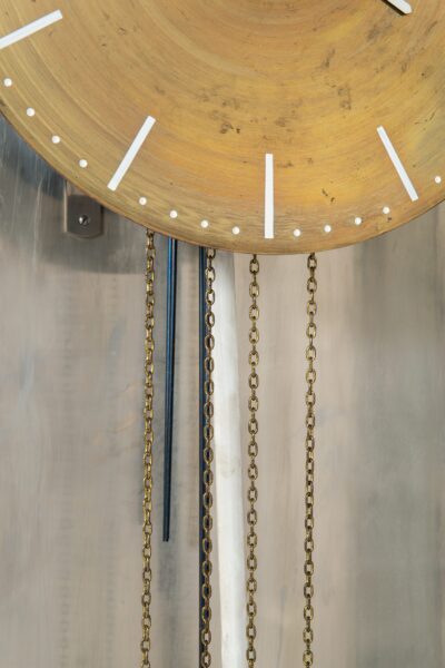 Modernist grandfather clock in steel at Studio Schalling