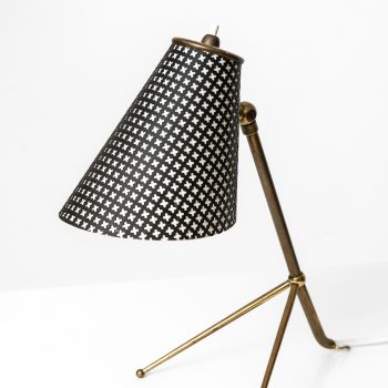 Table lamp in brass and black lacquered metal at Studio Schalling