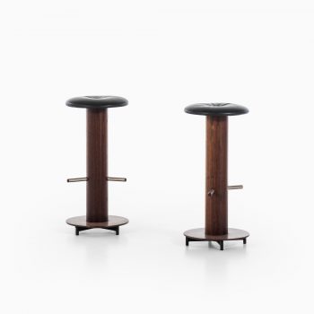 Bar stools in rosewood and black leather at Studio Schalling
