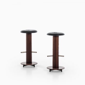Bar stools in rosewood and black leather at Studio Schalling
