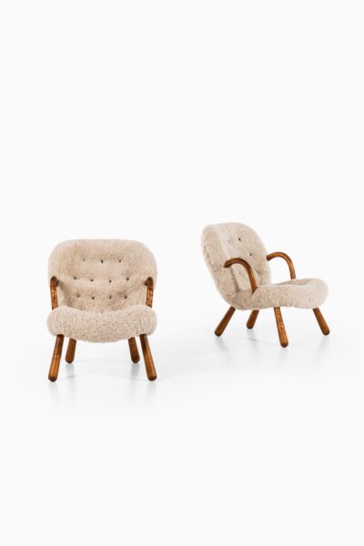 Philip Arctander clam easy chairs in sheepskin at Studio Schalling