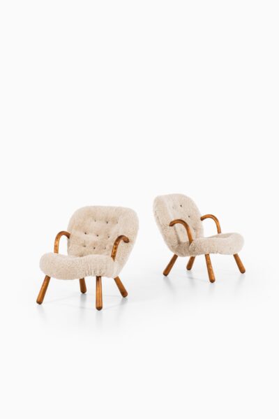 Philip Arctander clam easy chairs in sheepskin at Studio Schalling