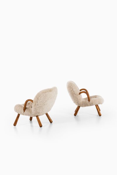 Philip Arctander clam easy chairs in sheepskin at Studio Schalling