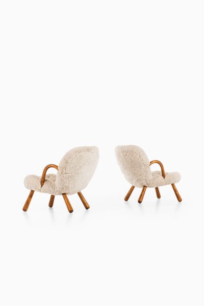 Philip Arctander clam easy chairs in sheepskin at Studio Schalling