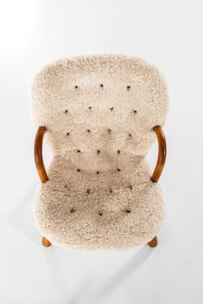 Philip Arctander clam easy chairs in sheepskin at Studio Schalling