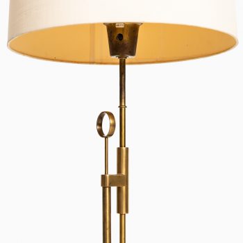 Height adjustable floor lamp in brass at Studio Schalling
