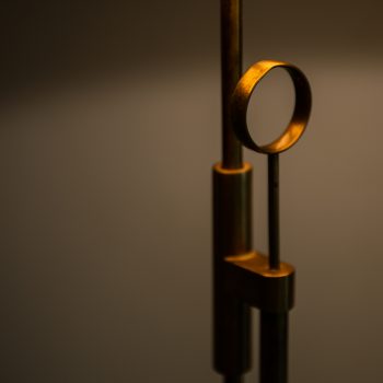 Height adjustable floor lamp in brass at Studio Schalling