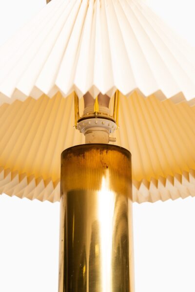 Pair of tall table lamps in brass at Studio Schalling