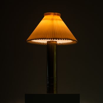 Pair of tall table lamps in brass at Studio Schalling