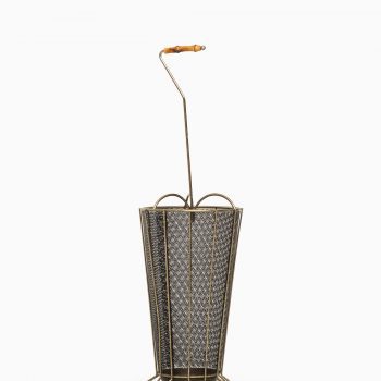 Umbrella stand in brass and black lacquered metal at Studio Schalling