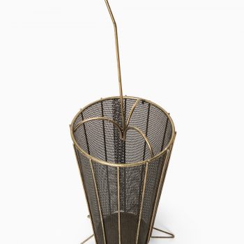 Umbrella stand in brass and black lacquered metal at Studio Schalling