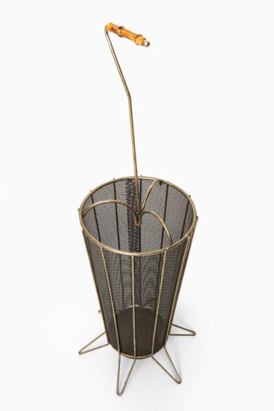 Umbrella stand in brass and black lacquered metal at Studio Schalling