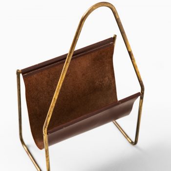 Carl Auböck magazine stand in brass and leather at Studio Schalling