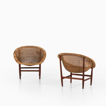 Nanna & Jørgen Ditzel easy chairs in teak and rattan at Studio Schalling