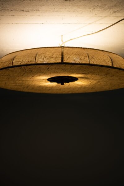 Pair of flush mount ceiling lamps in brass at Studio Schalling