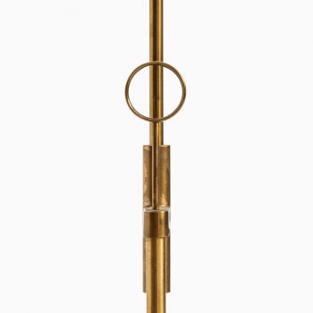 Height adjustable floor lamp in brass at Studio Schalling