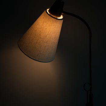 Height adjustable floor lamp in brass at Studio Schalling