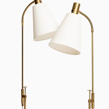 Pair of floor lamps in brass by Falkenbergs belysning at Studio Schalling