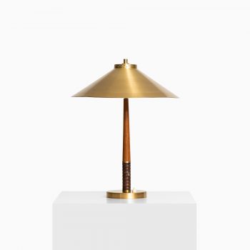 Table lamp in brass, teak and leather at Studio Schalling
