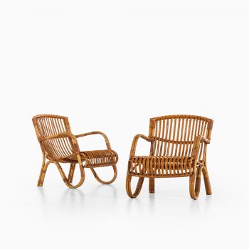 Easy chairs in rattan and cane at Studio Schalling
