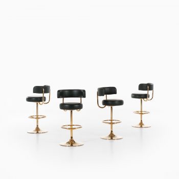Börje Johanson bar stools in brass and green imitation leather at Studio Schalling