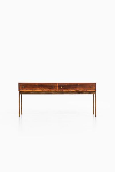 Poul Nørreklit side table in rosewood and brass at Studio Schalling