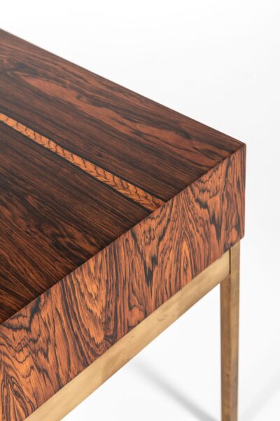 Poul Nørreklit side table in rosewood and brass at Studio Schalling