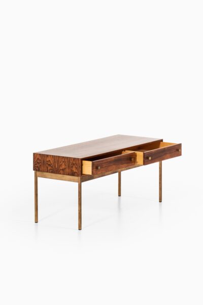 Poul Nørreklit side table in rosewood and brass at Studio Schalling