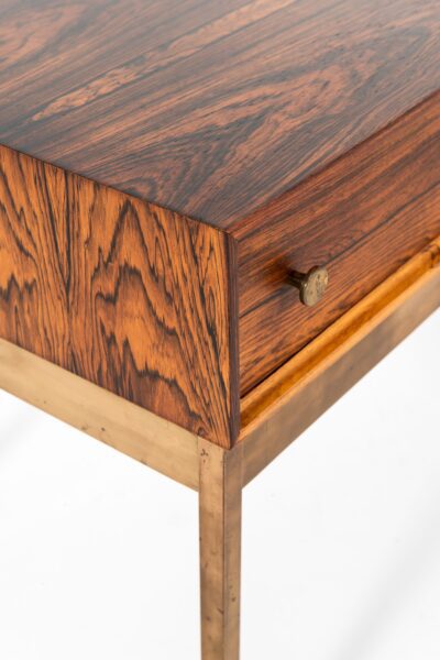 Poul Nørreklit side table in rosewood and brass at Studio Schalling