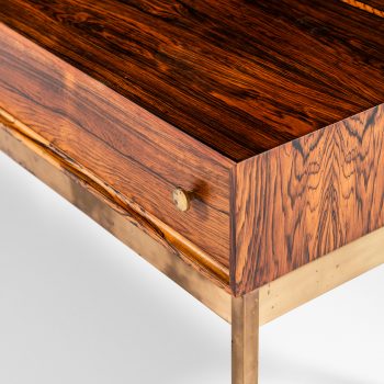 Poul Nørreklit side table in rosewood and brass at Studio Schalling