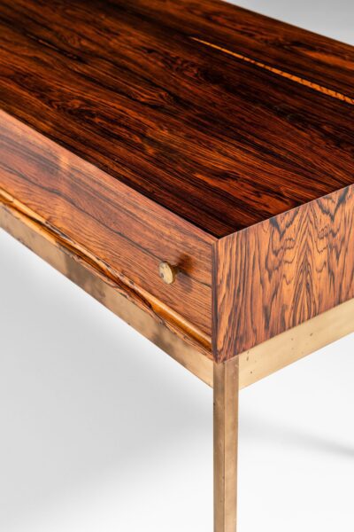 Poul Nørreklit side table in rosewood and brass at Studio Schalling